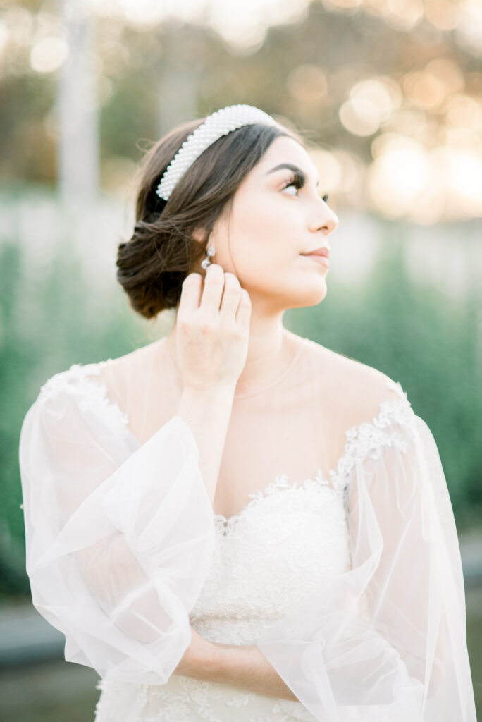 Lovely bride in white whimsical off the shoulder dress